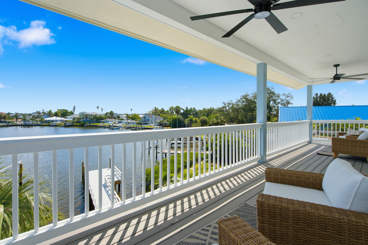 Covered balcony with water view